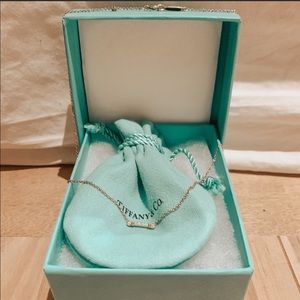 Tiffany&Co fleur de lis necklace in 18k rose gold